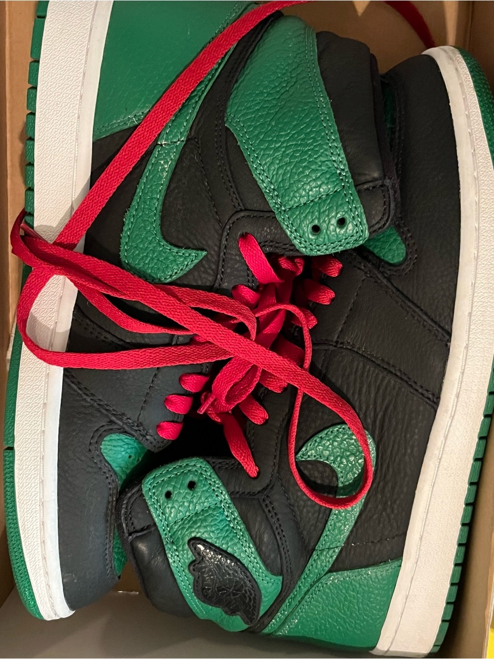 Nike Air Jordan 1 Retro Black and Green High-Top Sneakers with Red/Black Laces